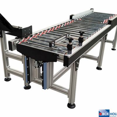 256264 Aangedreven rollenbaan met pneumatische pusher en stopper 256264 Aangedreven rollenbaan met pneumatische pusher en stopper