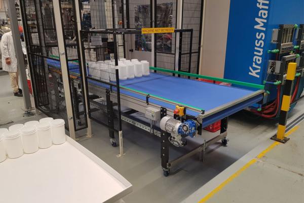 Afleg / afkoelband in de kunststofindustrie