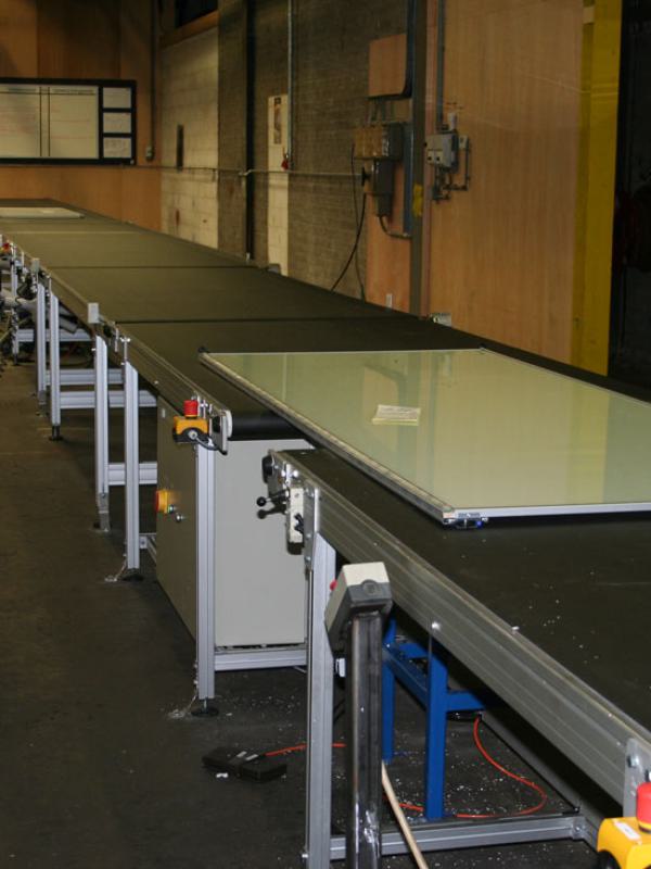 Belt conveyors with door panels