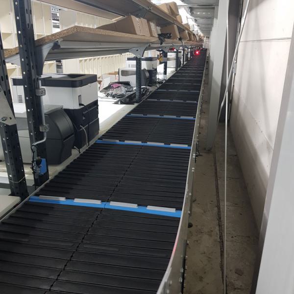 Discharge conveyor in logistics