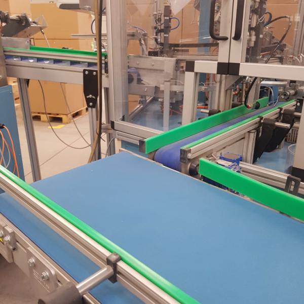 Production cell for plastic packaging